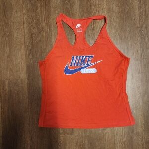 Nike Women's Bright Red Tank Top with Blue Logo. Looks Red But Its A Dark Orange